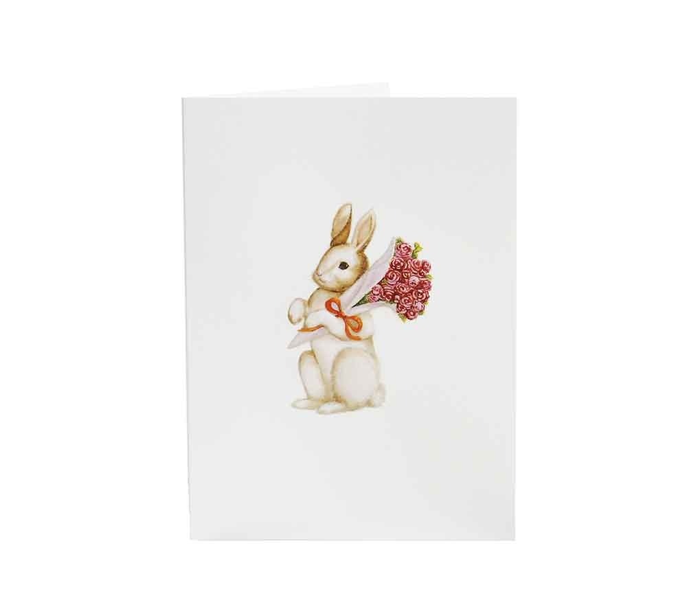 Grußkarte Osterhase mit Blumen von Paula Skene