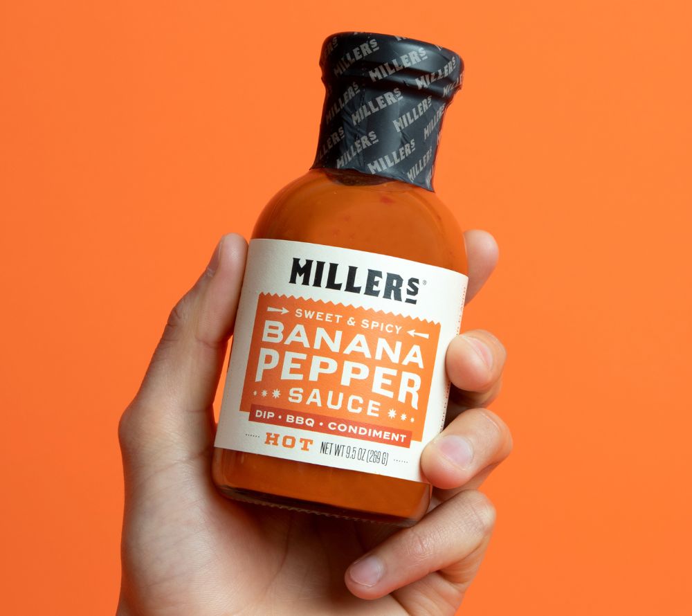 
                  
                    Banana Pepper Hot Sauce von Miller’s kaufen | Scharfe Pfeffersauce mit fruchtiger Süße | Frisch, fettfrei, glutenfrei, Non-GMO | Ideal zu BBQ, Käse & Burger | Scovie Award Gewinner | EU-Versand
                  
                