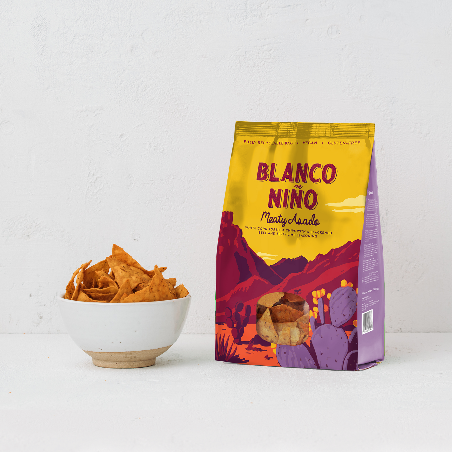 Meaty Asado Tortilla Chips von Blanco Niño – rauchig-würzige Tortilla Chips mit BBQ- und Limettennote, traditionell hergestellt aus regenerativ angebautem Mais.